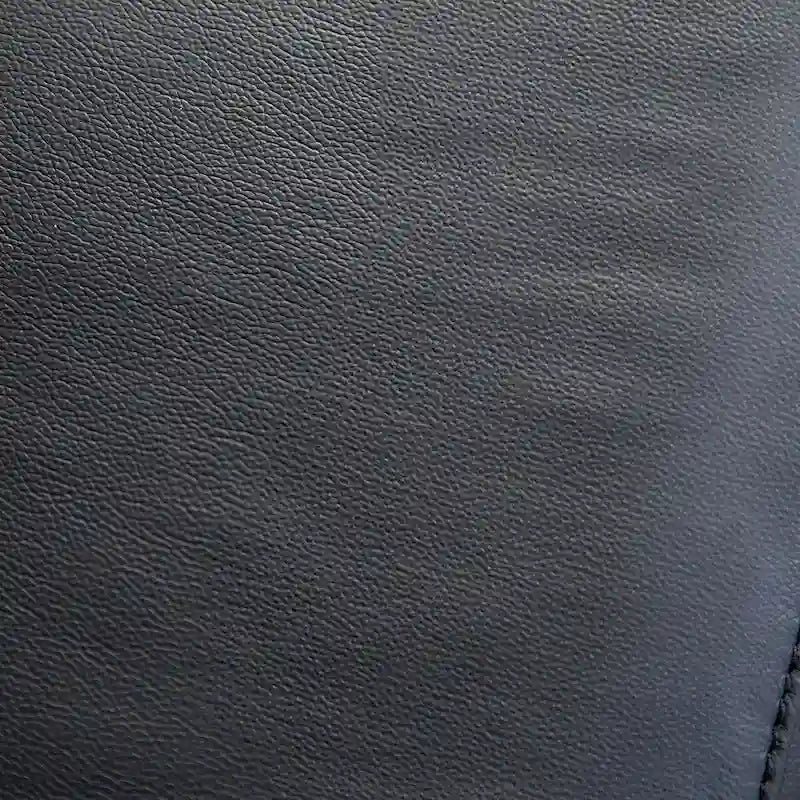 Furniture of America Marty Modern Leather Match Manual Reclining Sofa with Flared Padded Arms